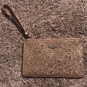 Coach gold and black sparkle star clutch